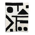 black and white modern art abstract crochet blanket kit laid out flat