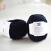 ball of navy wool on table, pure wool, british wool, lambswool