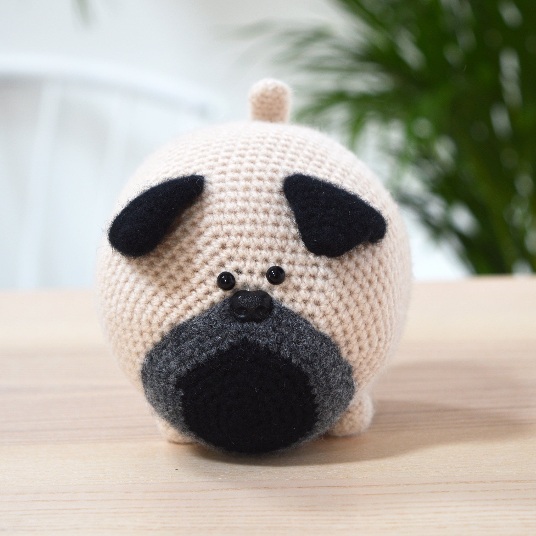 amigurumi pug crochet kit, finished dog on table