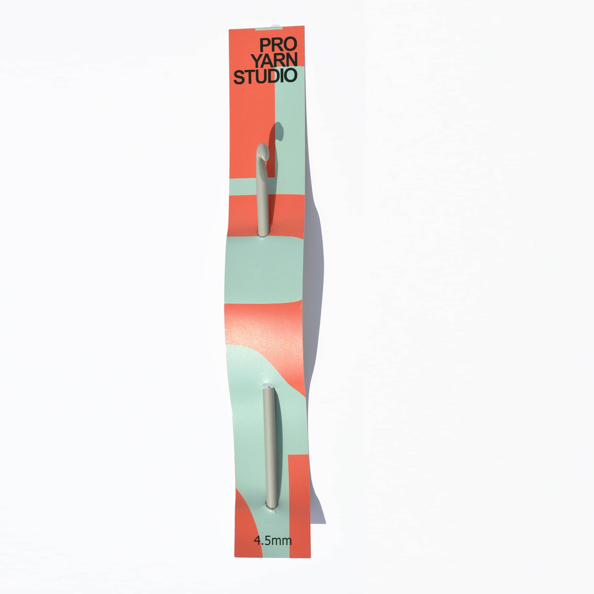 Knitting needle set in colorful packaging with 'Pro Yarn Studio' branding on a white background.