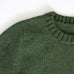close up of rib neckline.  knitting pattern, knitting kit, green jumper.  
