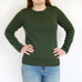woman wearing green knitted jumper classic crew neck knitting pattern