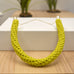 completed yellow version of chunky crochet necklace kit