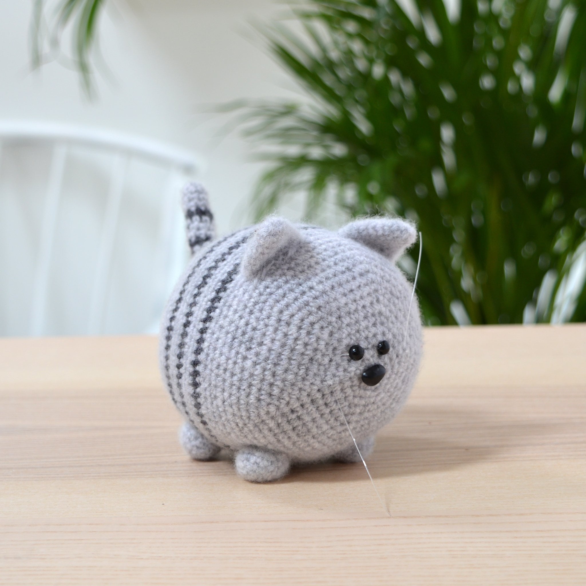 stripy cat crochet kit amigurumi cat finished standing on table