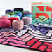 modern bright herringbone crochet blanket kit on table showing yarn and box