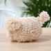 side view of completed amigurumi dog crochet kit